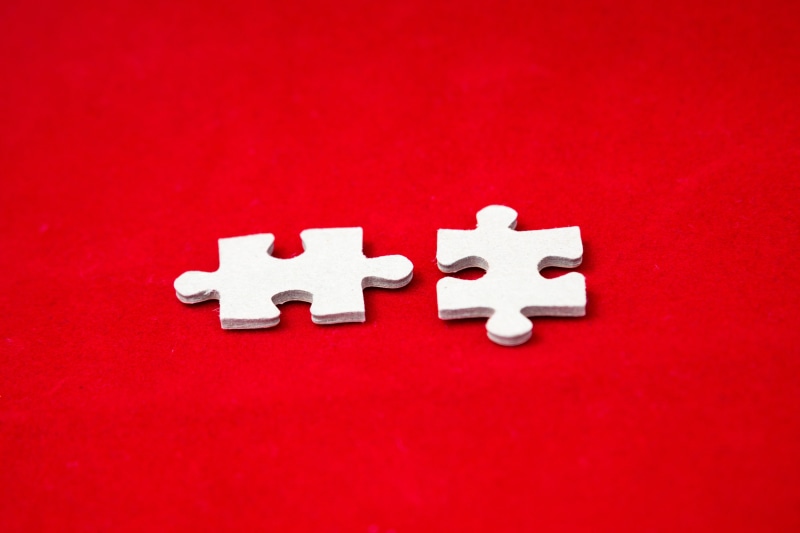 leisure Games, indoors, creativity, teamwork, white, jigsaw piece, communication, concepts, studio shot, part Of, colored background, no people, mixture