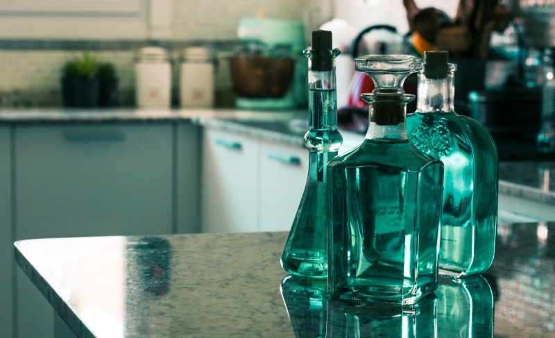 bottle, no people, goblet, refreshment, pub, cosmetics, glass, liquor, lab, freshness, indoors, cocktail, reflection, drink, food and drink, human, alcohol