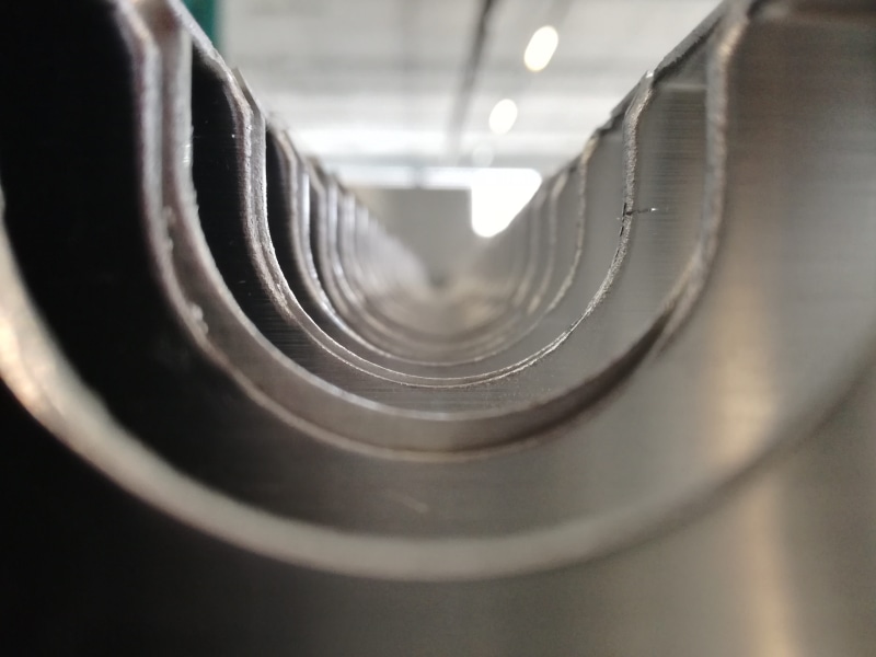 in a row, funnel, design, tunnel, industry, background, shape, white, close-up, frame, indoors, barrel, bright, color, inside, focus on foreground, railing