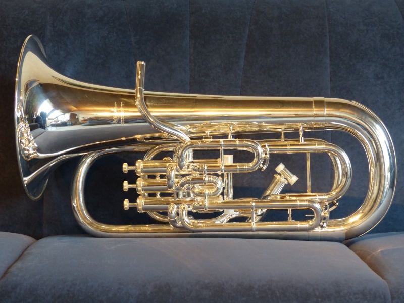 silver, bugle, gold colored, sofa, colored, gold, metal, close-up, pipes, wind instrument, no people, musical Instrument, brass, funnel, still life, euphonium