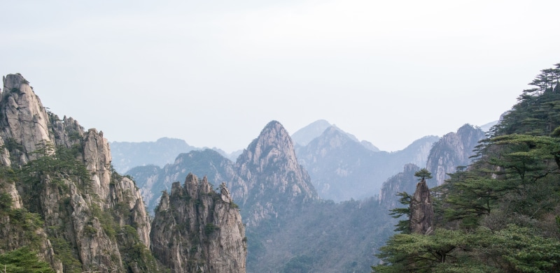 top, cliff, acid, mountain peak, travel, 2K, landscape paintings, mountain range, pine woodland, environment, landscape, beauty in nature, pinaceae, coniferous tree