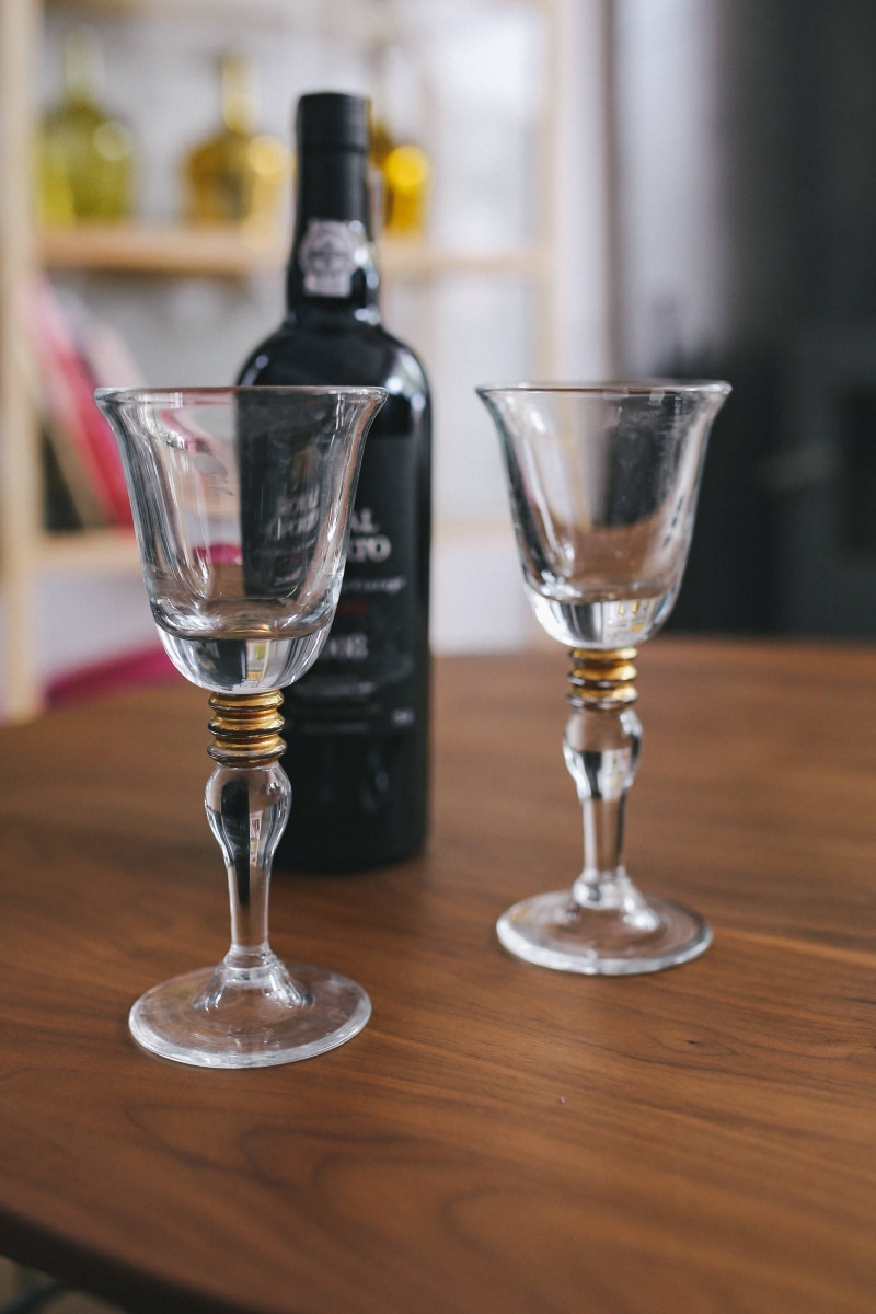 beverage, refreshment, restaurant, indoors, wood - material, focus on foreground, two, glasses, transparent, wine glasses, food, food and drink, table