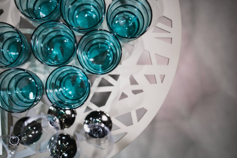 glasses, film industry, decoration, directly below, medium group of objects, low angle view, shiny, shape, drink, choice, White, table, wealth, variation