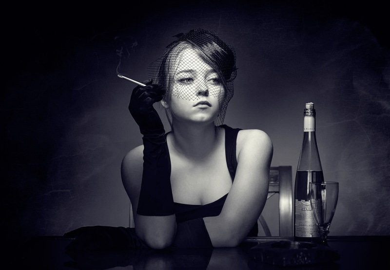 smoking, indoors, females, bottles, young adult, refreshment, hairstyle, looking away, alcohol, one person, monochrome, contemplation, beauty, young women