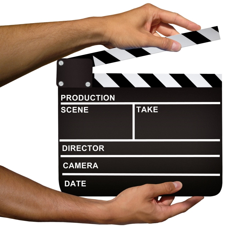 indoors, text, backgrounds, blackboard, cinematography, cameraman, producer, communication, human hand, scene, arts culture and entertainment, video, film industry