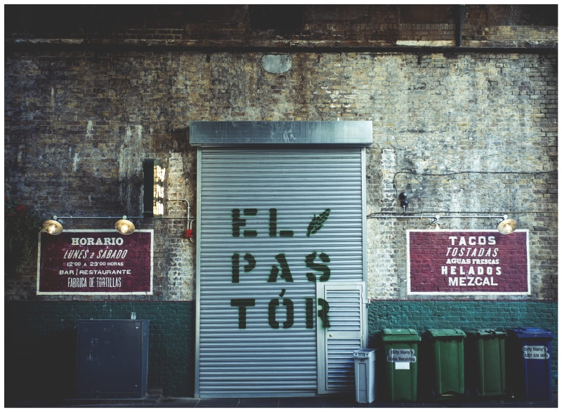 store, steel, trash, bricks, signs, no people, information sign, auto post production filter, outdoors, sign, garage, western script, shop, green, signage