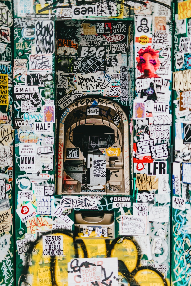 script, backgrounds, gritty, day, built structure, paper, atm, texture, graffiti, human representation, multi colored, untitled, street art, architecture