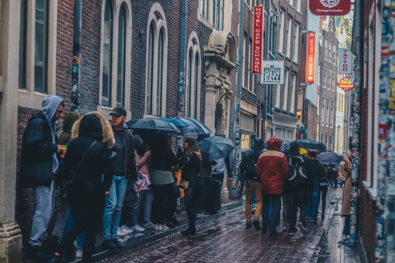 built structure, 5K, city life, human, lifestyles, person, waiting, gritty, dark, alley, men, amsterdam, queue, urban, netherlands, brick, architecture