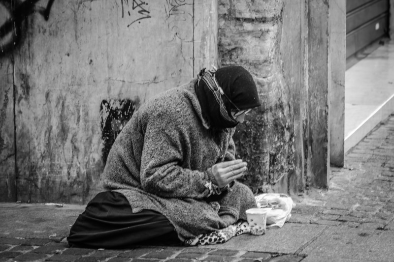 adult, grayscale, wear, relaxation, wall - building feature, side view, city, sit, photography, architecture, footpath, portrait, hopelessness, black and white