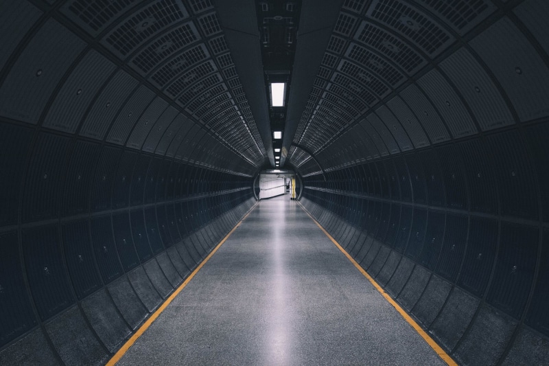 direction, day, underpass, architecture, illuminated, blade, black, dividing line, tunnel, absence, road, lighting equipment, ceiling, gray, subway, built structure