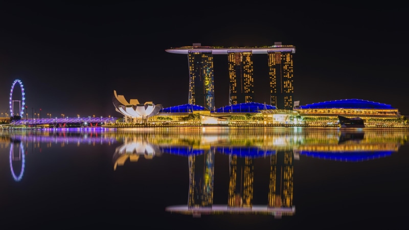 night, landmark, lighting, building, travel destinations, reflection, cityscape, tourist attraction, marina bay sands, architecture, built structure, tourism