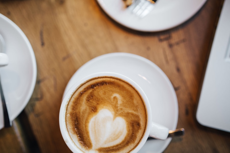 frothy drink, hot drink, directly above, saucer, refreshment, food, meeting, no people, high angle view, coffee - drink, table, coffee, indoor, caffeine