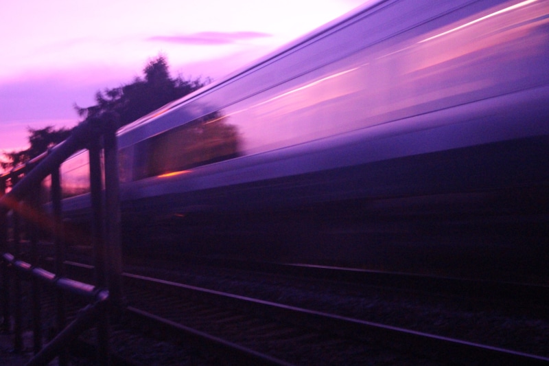 rail, no people, motion, sunset, rail transportation, railway, dusk, night, outdoors, track, dark, arrival, public transportation, purple, train, mode of transportation