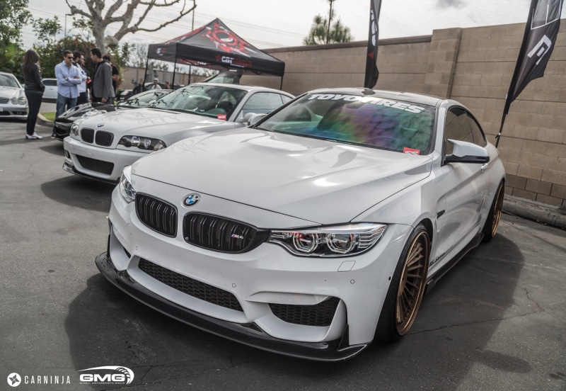 LB Performance, city, mode of transportation, sunset, real people, Carninja, outdoors, built structure, land vehicle, BMW M4 Coupe, lifestyles, incidental people