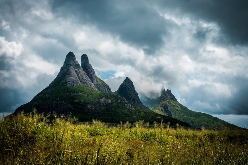 outdoors, non-urban scene, green Color, tranquility, no People, valley, mountain Peak, blue, scenics, plant, storm, meadow, landscape, forest, travel Destinations