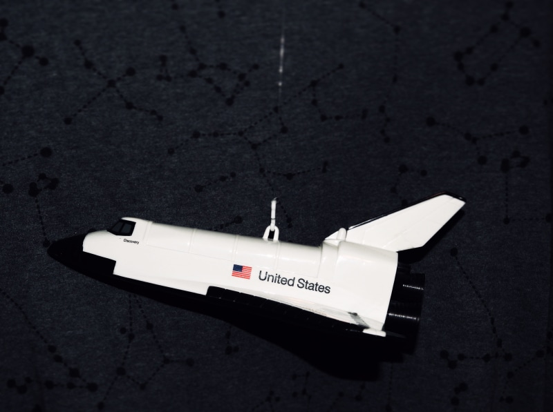 black color, surface, day, missile, airplane, weapon, toy, still life, no people, united, text, white, torpedo, united states, ridgewood, states, vehicle