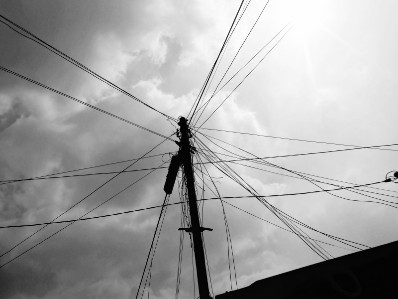 connection, geometry, cloud - sky, mono, technology, black, low angle view, no people, telephone line, sky, phone, pole, cable, telephone pole, electrical equipment