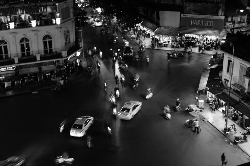 outdoors, scooters, motion, action, road, car, cityscape, high angle view, crossing, illuminated, building exterior, busy, city Life, downtown, junction