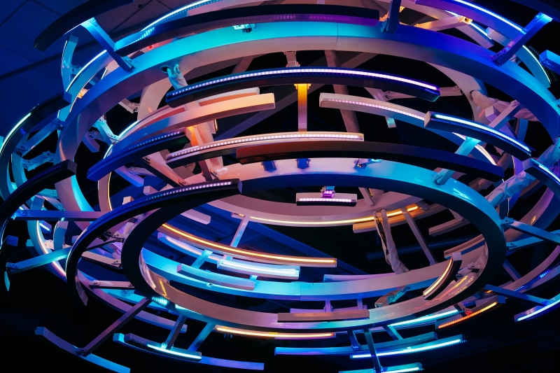 purple, lighting, art, built structure, close-up, art and craft, shape, design, bike, bicycle, ornament, multi colored, no people, circle, transportation