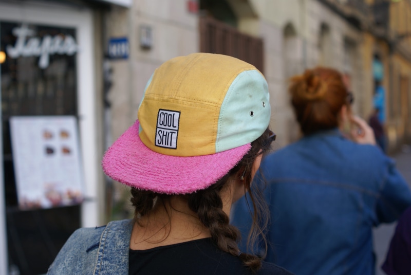 barcelona, clothing, portrait, day, leisure activity, warm clothing, built structure, headshot, city, hat, hairstyle, teal, hair, yellow, lifestyles, rear view