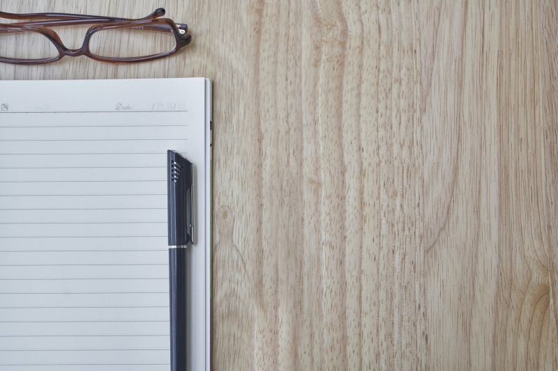 publication, white, table, take notes, page, note book, work, the work, nobody, no people, directly above, school, drawing, note, glasses, composition