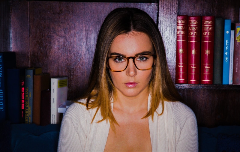 1080P, beautiful woman, young adult, Natasha Nice, home interior, hairstyle, indoors, books, looking at camera, women, women with glasses, eyeglasses