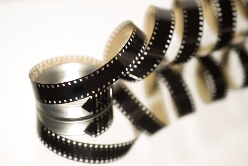 silver colored, vintage, roll, movie, close-up, indoors, cinema, screen, cinematography, black, industry, video, projector, spool, projection, tape, strip