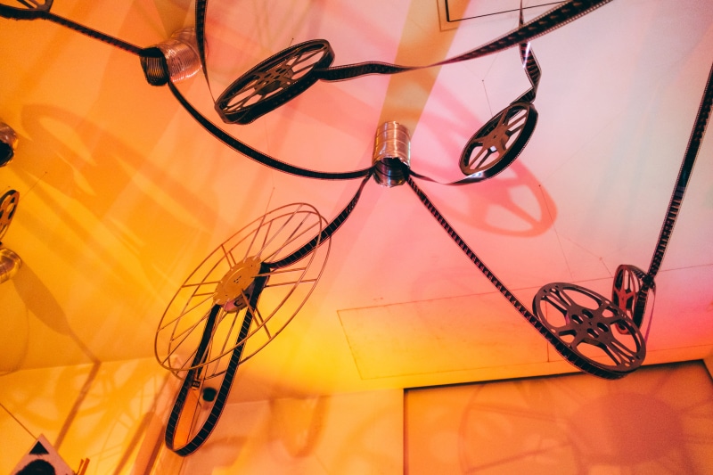 close-up, table, video, human hair, studio shot, glasses, roll, people, old, cine, shoe, film, scissors, negative, memories, studio, object, camera, retro