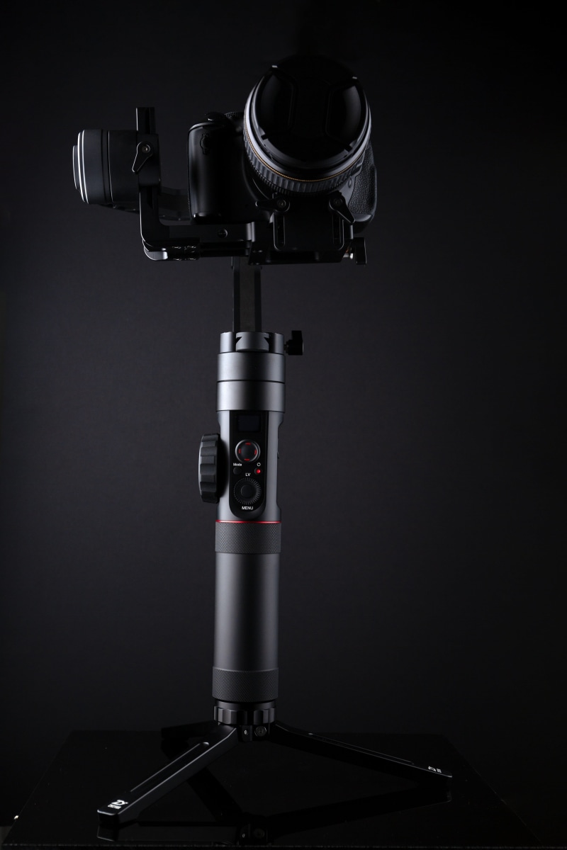 close-up, studio, crane, microscope, cinema, science, photography themes, filmmaking, black background, indoors, gimbal, stabilizer, arts culture and entertainment