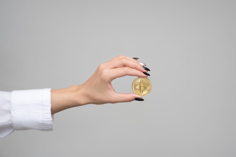 shape, adult, commerce, skin, financial, conceptual, woman, side view, copy space, currency, wealth, money, cryptocurrency, gold, girl, clock, human body part