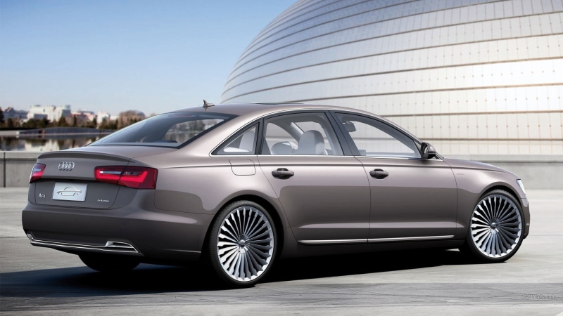 outdoors, silver colored, white color, mode of transportation, no people, luxury, building exterior, Audi A6, car, motor vehicle, architecture, wheel, chrome