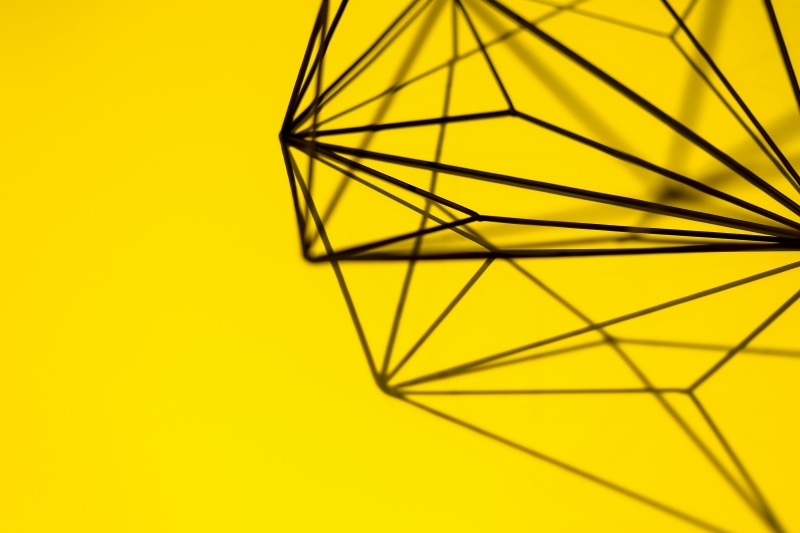 colored background, creativity, background, no people, art and craft, 5K, shape, triangle shape, studio shot, metal, single object, geometric, design