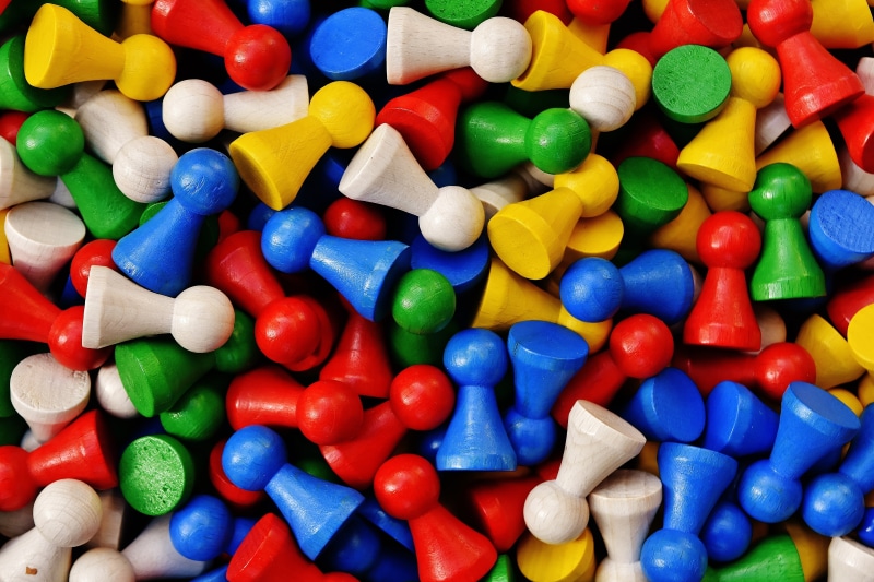no people, large group of objects, game characters, capsule, color, yellow, high angle view, abundance, play stone, full frame, white, heap, children, wood