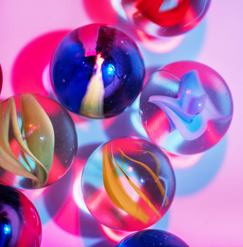 blue background, decorate, art, collection, toys, balls, objects, close-up, pastel, bright, pink color, colored background, backgrounds, indoors, motley