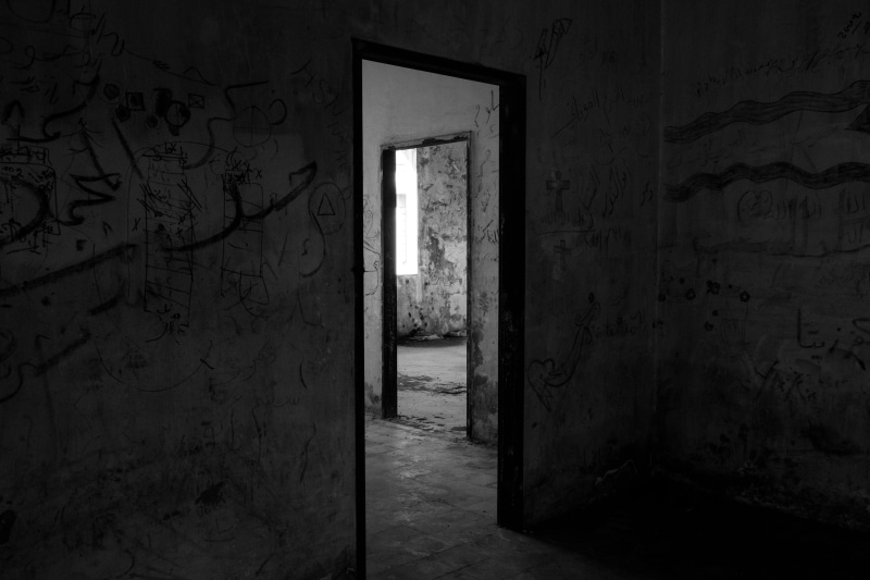 light, built structure, concrete, room, building, deterioration, bad condition, inside, no people, wall, messy, mysterious, doorway, damaged, dark, black