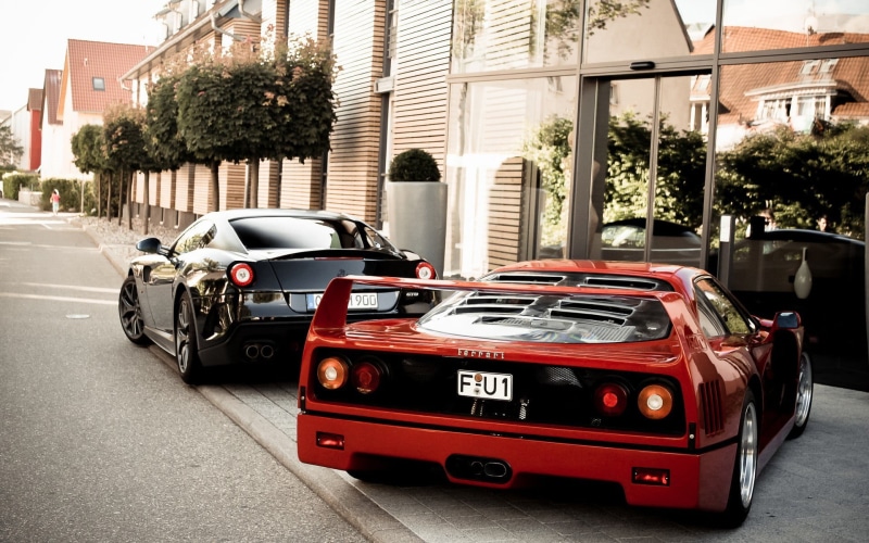 mode of transportation, 1080P, city, Ferrari, outdoors, Ferrari F40, plant, coupe, land vehicle, incidental people, street, architecture, corvette, tree