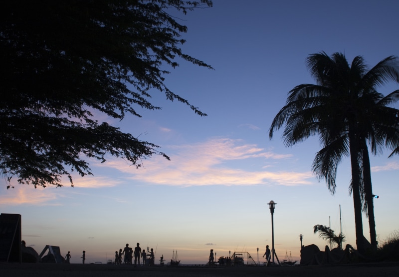 building exterior, palm tree, outdoors, no people, beauty in nature, nature, water, built structure, backlighting, travel, orange color, plant, scenics - nature