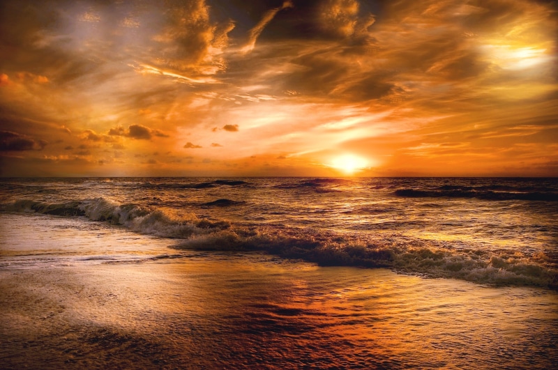 sky, seascape, tranquility, sunset, land, horizon, reflection, peaceful, clouds, no people, wave, scenics - nature, mood, dusk, sun, outdoors, motion, idyllic