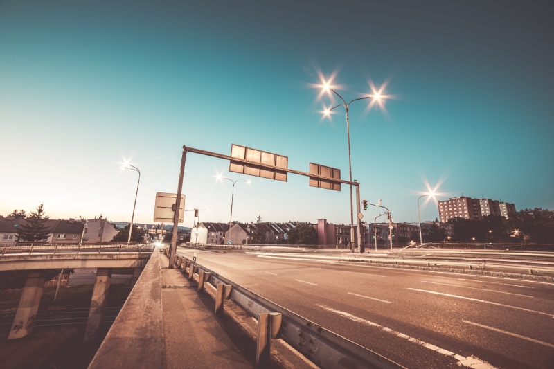 streets, no people, nature, city, architecture, symbol, sunset, light, roads, clear sky, lighting equipment, intersection, street, freight transportation