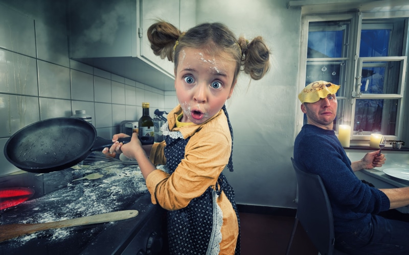 flour, cupboard, apron, burner, cooking splatter, cooking, stove, wooden spoon, indoors, window frames, smoke, window ledge, humor, pancakes, blue eyes
