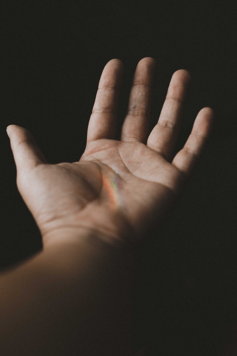 hand, unrecognizable person, strech, story, body part, human body part, lifestyles, hope, indoors, skin, close-up, human skin, personal perspective, dark background