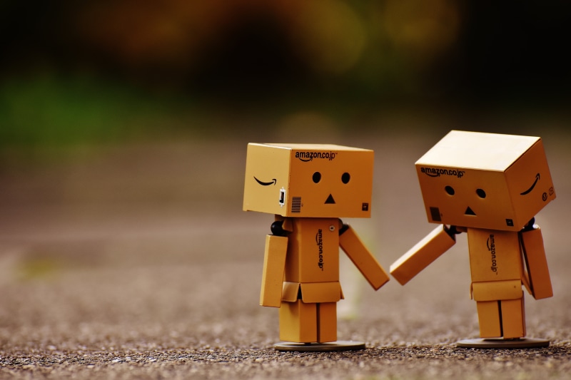 small, childhood, outdoors, creativity, robot, cardboard man, focus on foreground, yellow, human representation, walk, ideas, 5K, selective focus, figurine