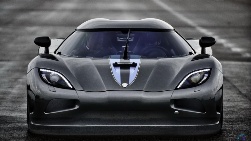 outdoors, transportation, security, supercar, front view, focus on foreground, sports race, car, motorsport, Koenigsegg, black, racecar, mode of transportation