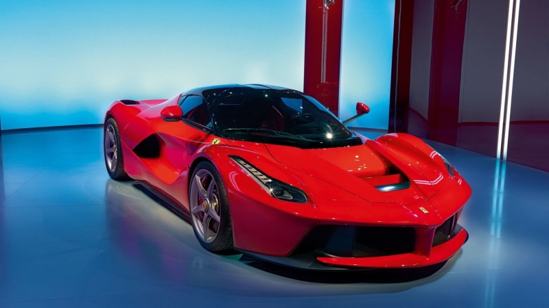 speed, travel, bed, racecar, Ferrari LaFerrari, red, indoors, clean, reflection, no people, black, toy, luxury, close-up, transportation, blue, white color