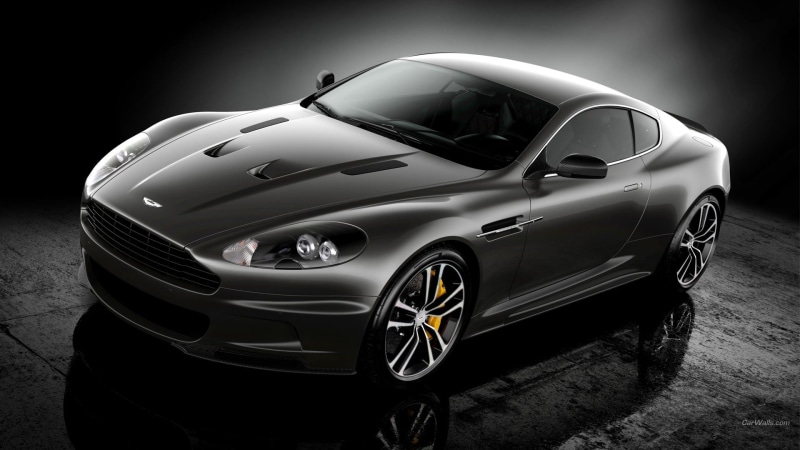 high angle view, vintage car, black color, indoors, Aston Martin DBS, car, travel, mode of transportation, 1080P, motor vehicle, transportation, chrome