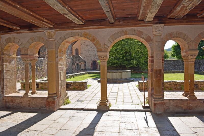 indoors, arch, abbey, sunlight, no people, built Structure, pilgrimage, architecture, day, beige, old village, concrete, ornate, travel destinations, architectural Column