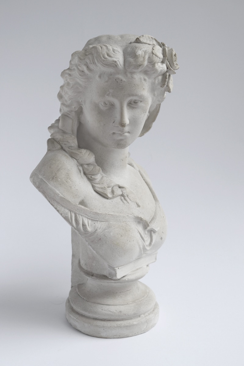 cut out, mythology, historic, history, sculpture, antique, stone, head, indoors, statue, historical, studio shot, face, close-up, figurine, traditional