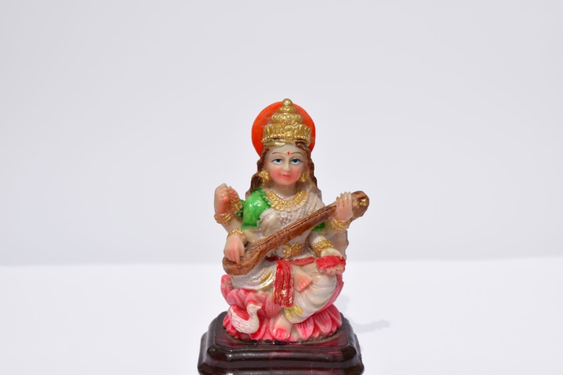 smiling, child, saraswati, art and craft, one person, childhood, offspring, india goddess, front view, indoors, studio shot, 5K, representation, red, clothing
