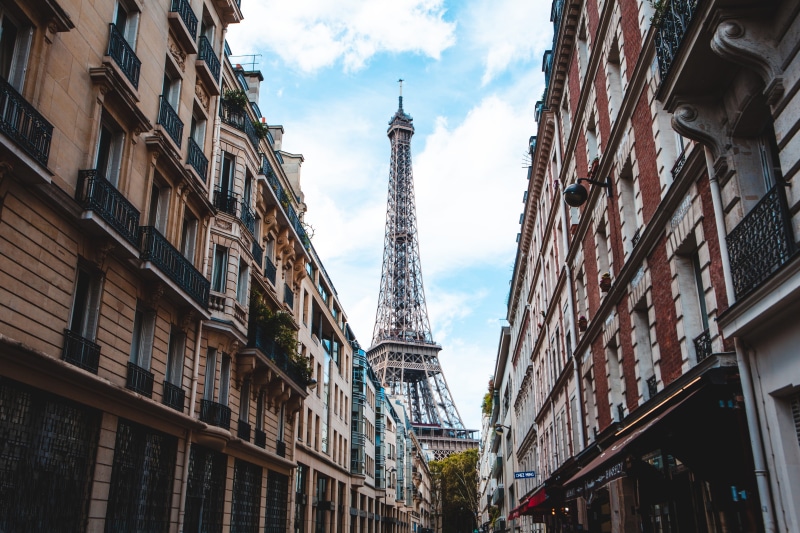 downtown, tourism, the past, building exterior, tall - high, travel, europe, skyscraper, tour, cloud - sky, low angle view, urban, metropolis, travel destinations