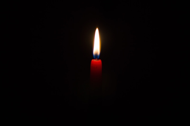 black Color, praying, wax, Candle, indoors, heat - Temperature, close-up, lighted, lighting Equipment, religion, glowing, black background, nature, domestic room